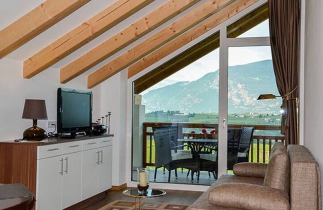 Oberberghof - Holiday apartment with terrace, fantastic view and organic bathing pond