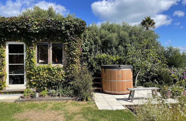 Private. Sunny. Twin sea views, cedar tub, mediterranean gardens, flat lawns.