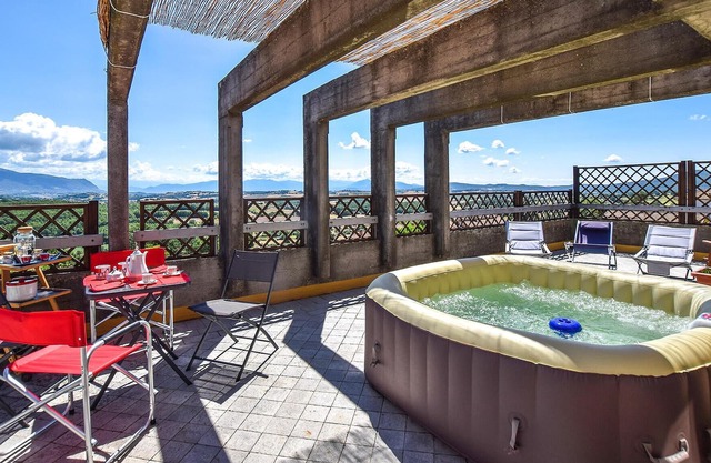 Relax in the whirlpool with panoramic views of the Umbrian countryside.