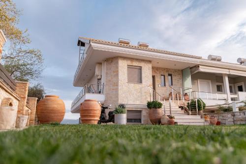 Sofita με θέα τη θάλασσα Villa Athina