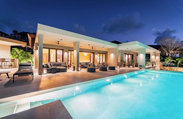 Spacious 6 bedroom hillside villa w/infinity pool, gym, and stunning views.