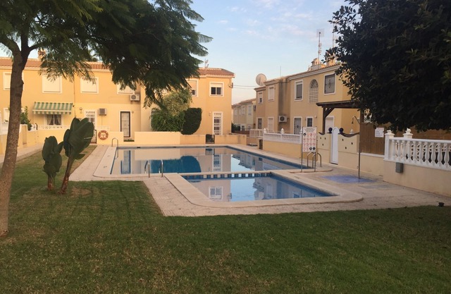 Stunning 2 Bedroom Apartment Backing Onto Pool With Great Outside Space