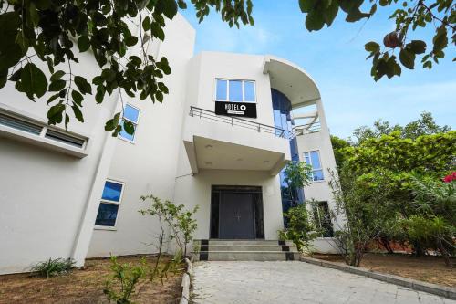 Super Hotel O ECR Stays Near Nemmeli Beach Formerly GVS Homes