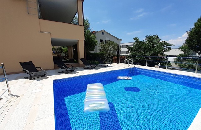 Three bedroom apartment with terrace Malinska, Krk (A-19304-a)