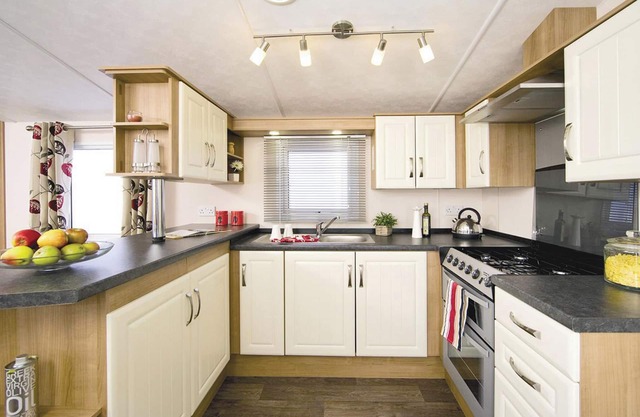 Top of the range 12ft-wide caravan with one double and one twin.