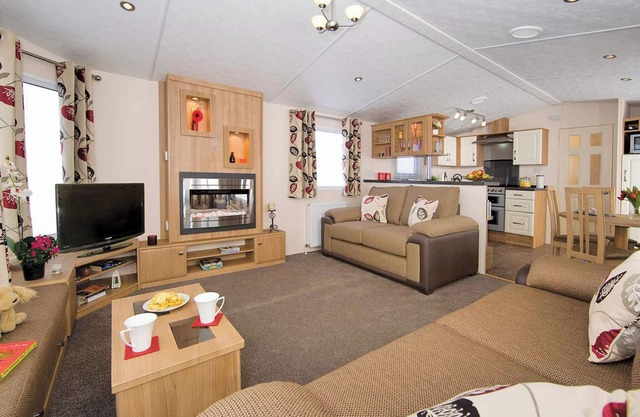 Top of the range 12ft-wide caravan with one double and two twin.