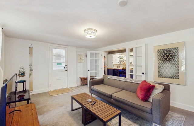 Tranquil, walkable home with seasonal pool, beautiful gardens & 2 patios