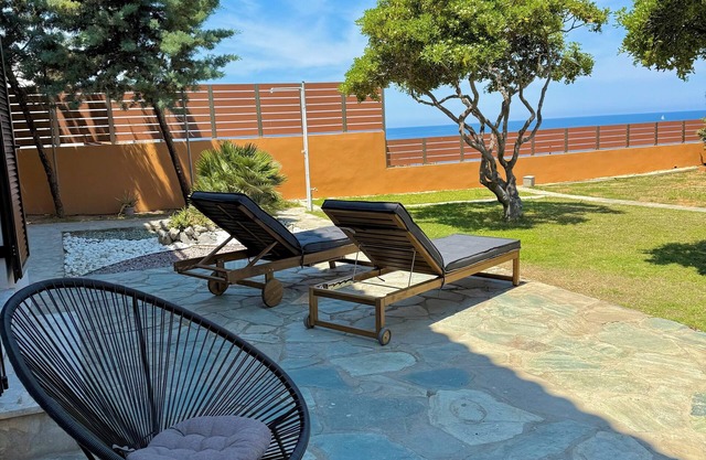 Unick Avra Luxury Living -nExpansive private garden with breathtaking sea view