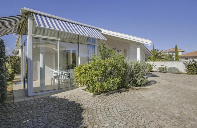Villa 2 chambres proche plage, jardin, véranda, clim, wifi à Biscarrosse - FR-1-521-19