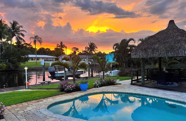 Waterfront home with Private Pool & Dock in Palm City. Pet friendly.