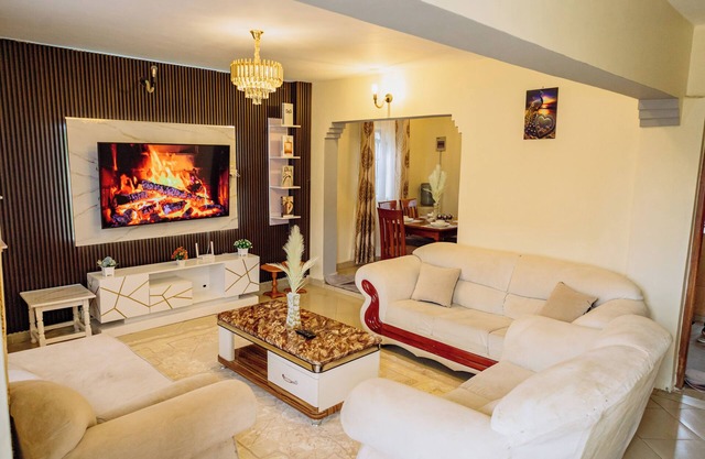 Welcome to your perfect getaway! This stunning 3-bedroom house, located in Thika
