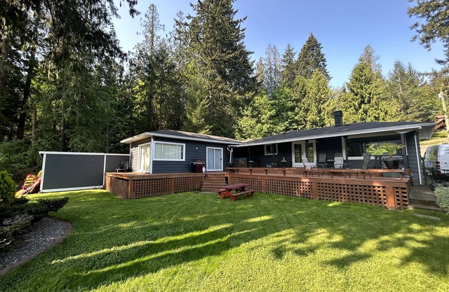 West House! A beautiful lake front home with hot tub and dock.
