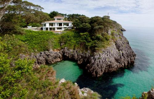 Wishome- Villa privada de ensueño sobre el mar, piscina climatizada