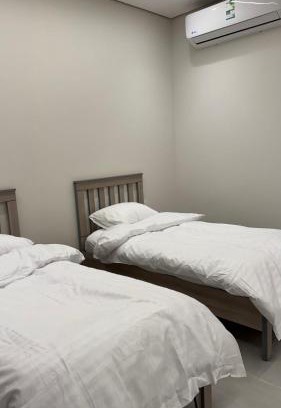 Almajaridah Apartment | غرفة نوم بسريرين مفرده