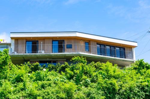 Shikiya House | 海と星の南城邸