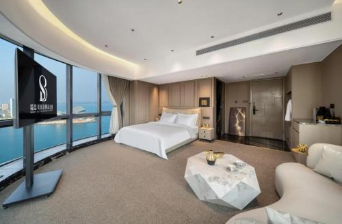 Chikan District Hotel | 瑞思贝海景精品公寓
