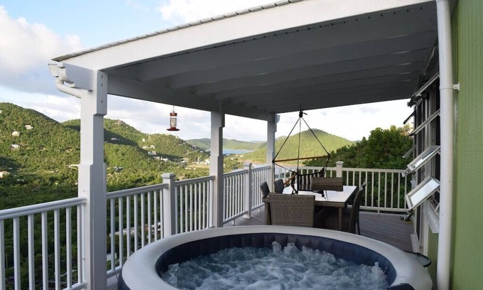 Lower Carolina Villa | 20% off! Charming cottage -water view, hot tub, outdoor shower, battery backup!