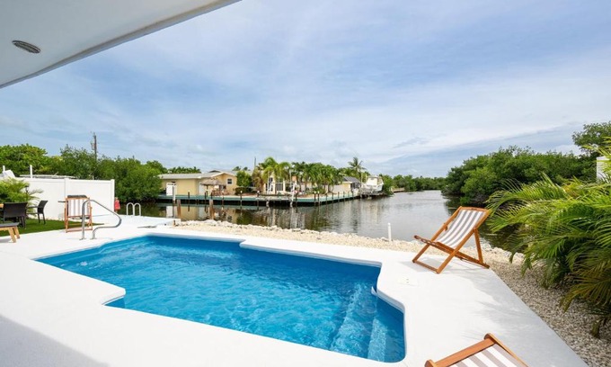 Marathon House | 4BR Sombrero Beach House on Canal w Dock & Pool