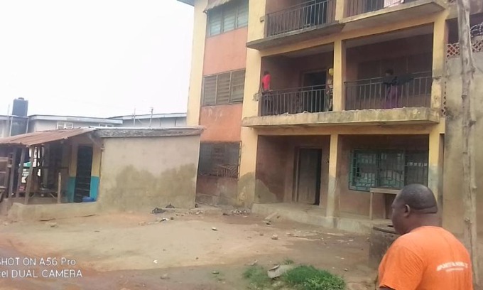 Ibadan Apartment | A 2-story building with 2 shops