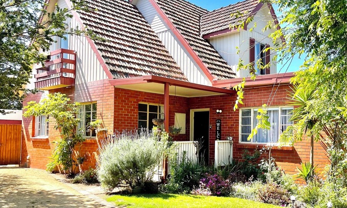 Rosebud Cottage | A charming european cottage close to the beach.