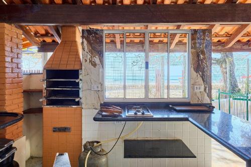 Toninhas House | Af-67 Toninhas Pé na Areia com Ar e Piscina Casa A