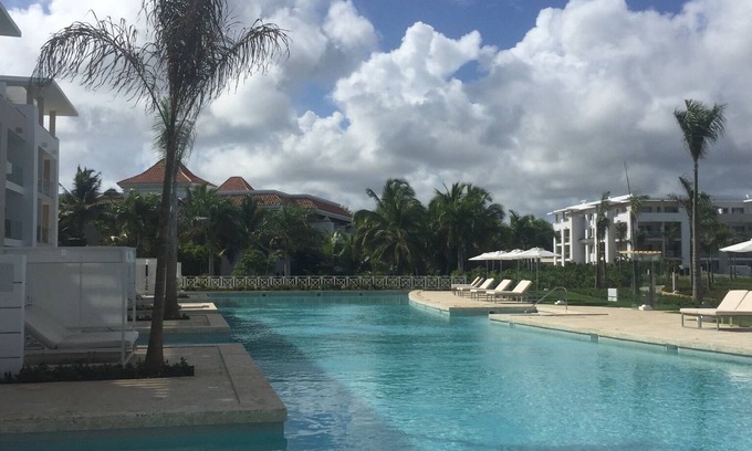 Punta Cana Apartment | Alll inclusive 4 stars resorts walking distance to the beach fine dining