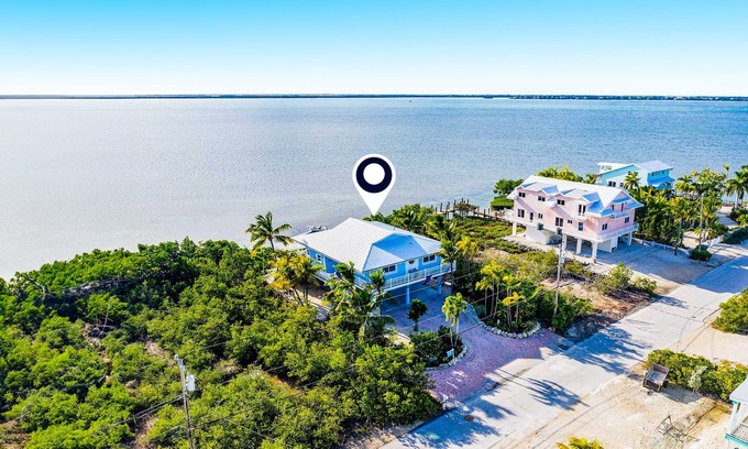 Cutthroat Harbor Estates House | Amazing waterfront home with private beach, dock, pool, WiFi & outdoor kitchen