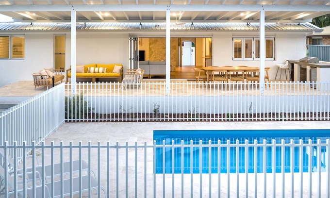 Agnes Water House | Amira Beach House - luxurious air conditioned property, pool, next to beach, pet friendly, wifi
