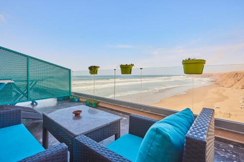 Mirleft Apartment | Amwaj Apt - Surf and Fun Beachfront Stay With Balcony