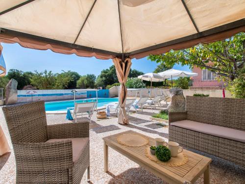 Trinita d'Agultu Apartment | Apartment L'Oasi Trilo A6 by Interhome