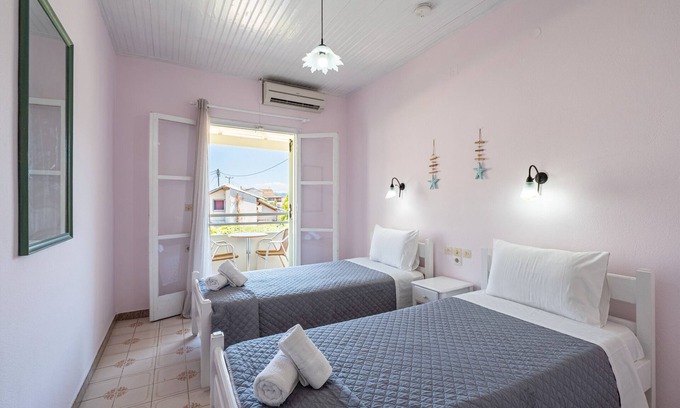 Roda Apartment | Apartment 'Alexandros Studios 2' with Shared Pool, Wi-Fi and Air Conditioning
