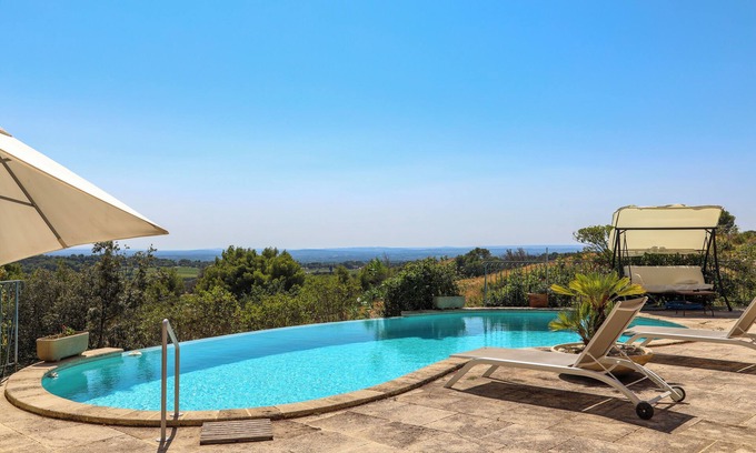 Saint-Hippolyte-le-Graveyron Villa | ✨Architect-designed villa with infinity pool and exceptional natural setting✨