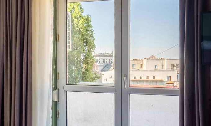 Bucharest City-Centre Apartment | Artful & Light-Filled 2BR on Calea Victoriei - Prime Central Spot