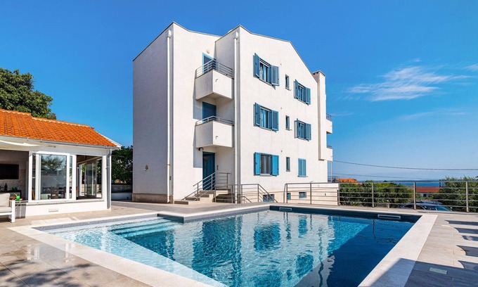 Preko Apartment | Attractive apartment with shared pool and sea view for a great vacation.
