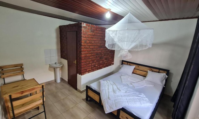 Kigali House | AUBERGE DE NYAMIRAMBO