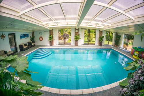 Hastings House | Badgers Den - Covehurst Bay Holiday Cottage