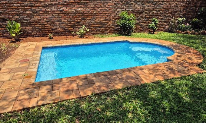 Victoria Falls House | Baikiaea