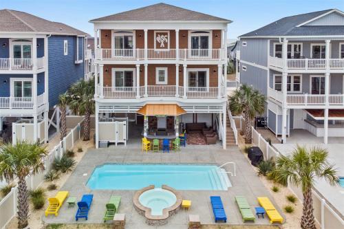 Ocean Isle Beach House | Beach Easy Private Heated Pool, Tiki Bar, Elevator