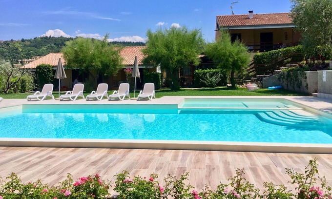Garda Apartment | Beautiful apartment for 4 people with pool, A/C, WIFI, TV, terrace, panoramic view and parking