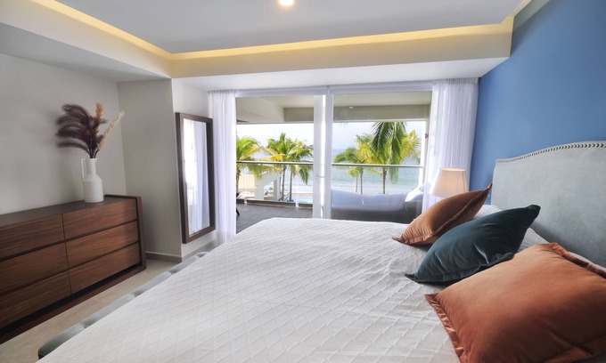 Las Glorias Apartment | BEAUTIFUL BEACHFRONT CONDO WITH POOL