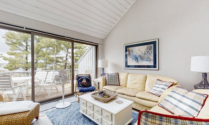 Glen Arbor House | Beautiful beachfront townhouse with deck, water views, community firepit
