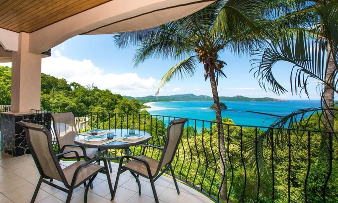 Playa Flamingo Condo | Beautiful Condo in Peaceful Cliffside Location with a Private Balcony & Stunning Ocean and Mountain Views