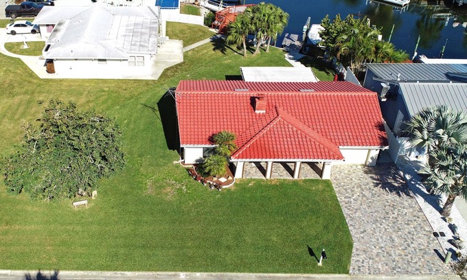 New Port Richey House | Beautiful home on a deep water canal leading to the Gulf of Mexico.