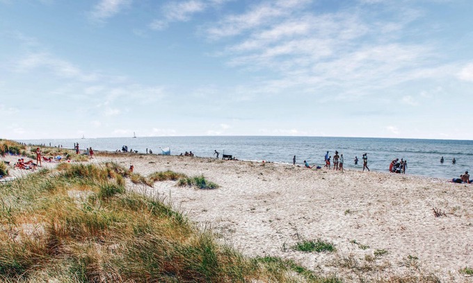Øer Strand House | Beautiful terraced house on the water.