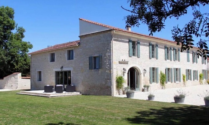Macqueville Cottage | Beautifully restored farmhouse and grounds in the heart of a picturesque village
