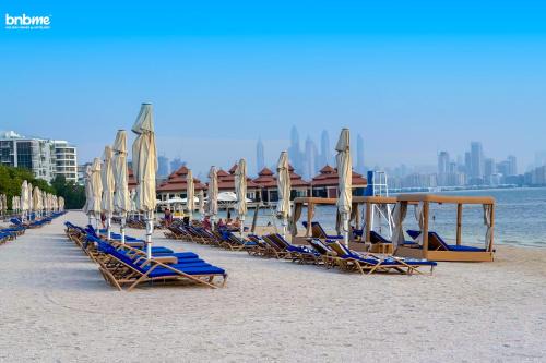 Palm Jumeirah Apartment | bnbme - Luxury 2BR Anantara Palm Apt Beachfront Lagoon Pools Balcony & Spa Access