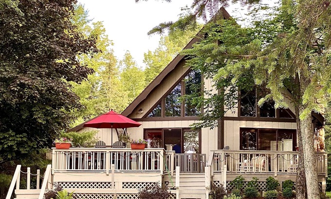 Indian River House | Book now for Fall! Cozy home on Mullett Lake, fireplace, deck, fire pit