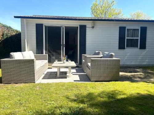 Oisterwijk Ski Chalet | Boshuisje met airco!