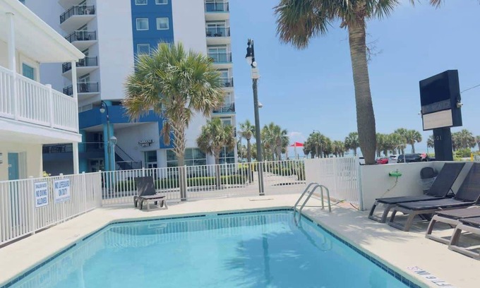 Downtown Myrtle Beach Apartment | Boutique on the beach, Studio #108 + Pool