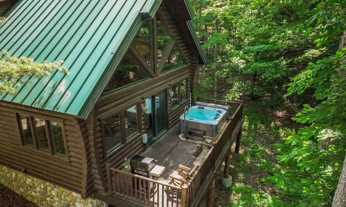 Boyne City Cottage | Boyne Mountain Cabin with Hot Tub Next to Skiing and Golf!